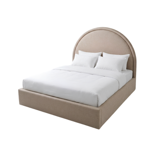 Beige upholstered bed with white bedding on a white background