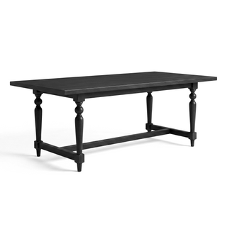 Black wooden table with spindle legs on a white background