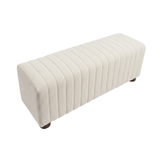 An upholstered rectangular bench with a cream-colored ribbed fabric and small dark wooden feet, shown on a plain white background.